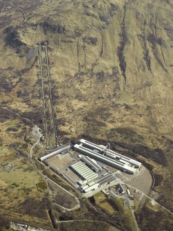 Oblique aerial view centred on the Lochaber aluminium works, Fort William, penstocks and electricity generating station, taken from the WNW.