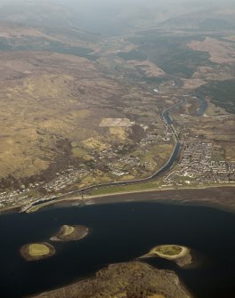 General oblique aerial view centred on the canal, taken from the SW.
