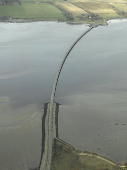 Oblique aerial view centred on the road bridge, taken from the SE.