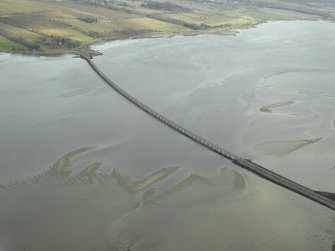 Oblique aerial view centred on the road bridge, taken from the SW.