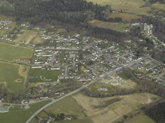 General oblique aerial view centred on the village, taken from the SE.