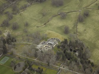 Oblique aerial view centred on the country house, taken from the WNW.