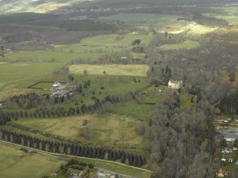 General oblique aerial view centred on the country house and gardens with the farmhouse and farmsteading adjacent, taken from the ESE.