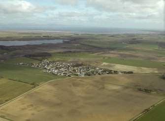 General oblique aerial view centred on the village, taken from the SW.