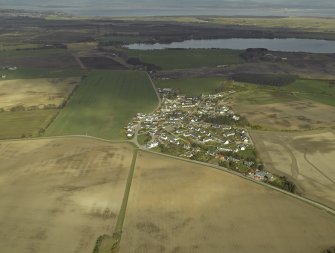 General oblique aerial view centred on the village, taken from the SSE.