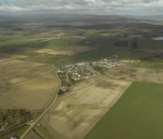 General oblique aerial view centred on the village, taken from the E.