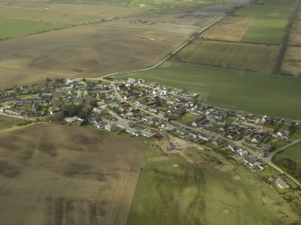 Oblique aerial view centred on the village, taken from the NE.