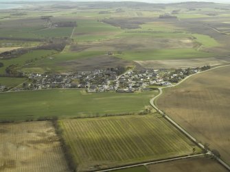 General oblique aerial view centred on the village, taken from the WSW.