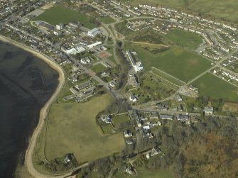 Oblique aerial view of the town centred on the church, manse and burial-ground, taken from the ESE.