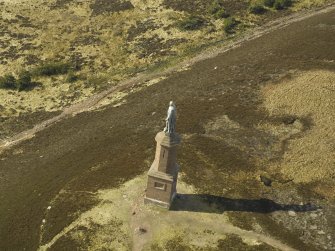 Oblique aerial view centred on the monument, taken from the E.