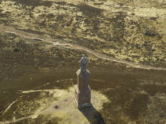 Oblique aerial view centred on the monument, taken from the NE.