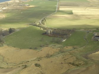 General oblique aerial view centred on the castle, taken from the SSW.