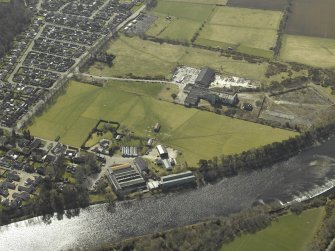 Oblique aerial view centred on the mill, taken from the NE.