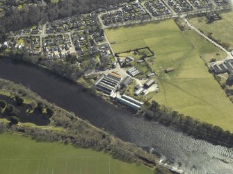 Oblique aerial view centred on the mill, taken from the NW.