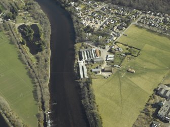 Oblique aerial view centred on the mill, taken from the W.