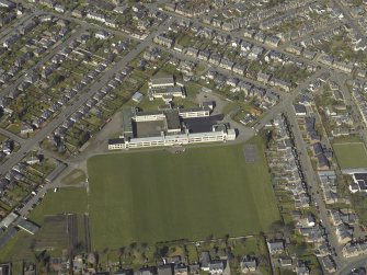 Oblique aerial view centred on the school, taken from the SE.