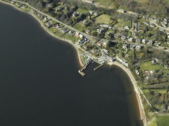 Oblique aerial view centred on the harbour, taken from the ESE.