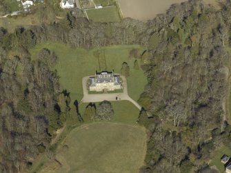 Oblique aerial view centred on the country house and gardens, taken from the SW.