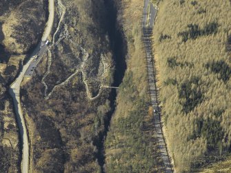 Oblique aerial view centred on the suspension bridge, taken from the SE.