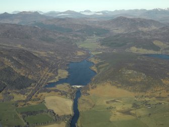 General oblique aerial view looking towards Loch Achonachie centred on the dam and electricity generating station, taken from the ESE.