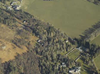 General oblique aerial view centred on the country house, gardens and cottages, taken from the S.