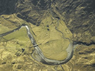 Oblique aerial view centred on the road bridge and the remains of the townships and sheepfolds, taken from the NW.