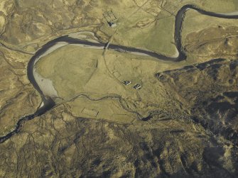 Oblique aerial view centred on the road bridge and the remains of the townships and sheepfolds, taken from the SSW.