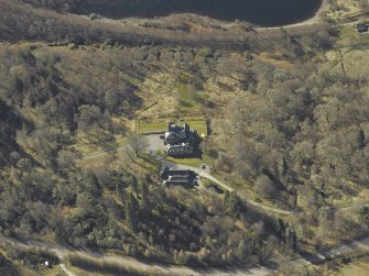 Oblique aerial view centred on the lodge, taken from the NNE.