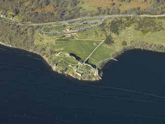 Oblique aerial view centred on the castle, taken from the E.