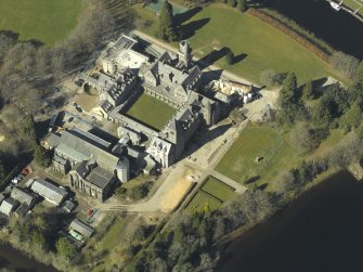 Oblique aerial view centred on the abbey and school, taken from the SE.