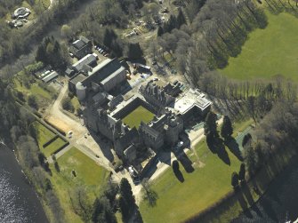 Oblique aerial view centred on the abbey and school, taken from the NNE.
