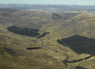 General oblique aerial view centred on the military road, taken from the ESE.