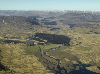 General oblique aerial view centred on the course of the military road, the road bridge, shooting lodge, lodge and stables, taken from the E.