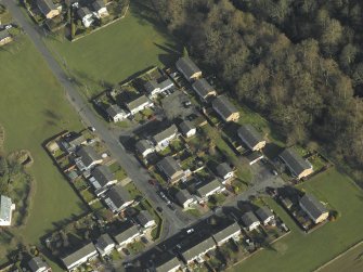 Oblique aerial view centred on King's Gate housing estate, taken from the SSW.