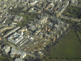 Oblique aerial view centred on the old Royal Infirmary Hospital and George Heriot's School, taken from the SW.