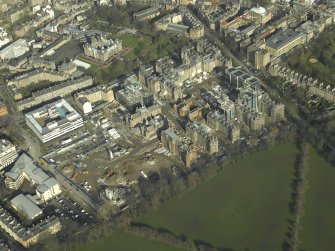 Oblique aerial view centred on the old Royal Infirmary Hospital and George Heriot's School, taken from the SSW.