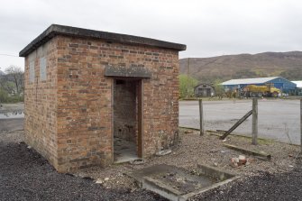 View.  Brick and concrete hut.