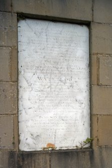 Detail.  Modern copy of inscription in memory of Colonel John Cameron hung on the enclosing fence.
