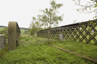 View.  From S showing lattice girder bridge.