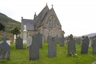 View from E.  Showing church with part of burial-ground and slate graveslabs.