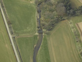 Oblique aerial view centred on the footbridge, taken from the E.