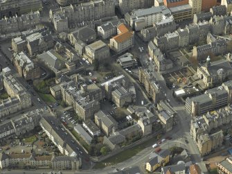 Oblique aerial view of the town centred on the university buildings, taken from the ESE.