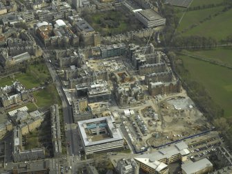Oblique aerial view centred on the redevelopment of the hospital for housing, taken from the WNW.