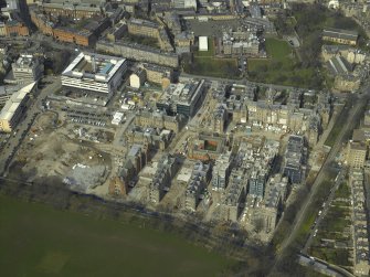 Oblique aerial view centred on the redevelopment of the hospital for housing, taken from the SE.