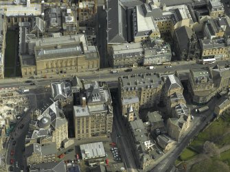 Oblique aerial view centred on the libraries, taken from the W.