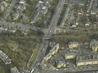 Oblique aerial view centred on the railway bridge, taken from the WSW.