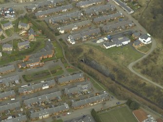 Oblique aerial view of the town centred on the railway tunnel, taken from the SW.