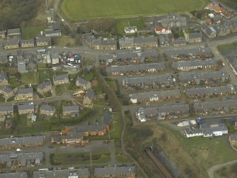 Oblique aerial view of the town centred on the railway tunnel, taken from the S.