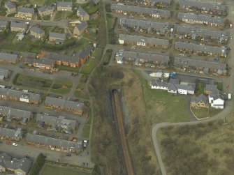 Oblique aerial view of the town centred on the railway tunnel, taken from the SE.