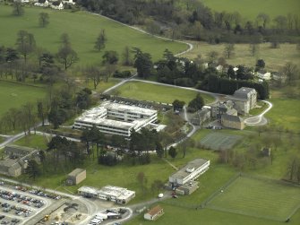 Oblique aerial view centred on the military headquarters, taken from the NW.